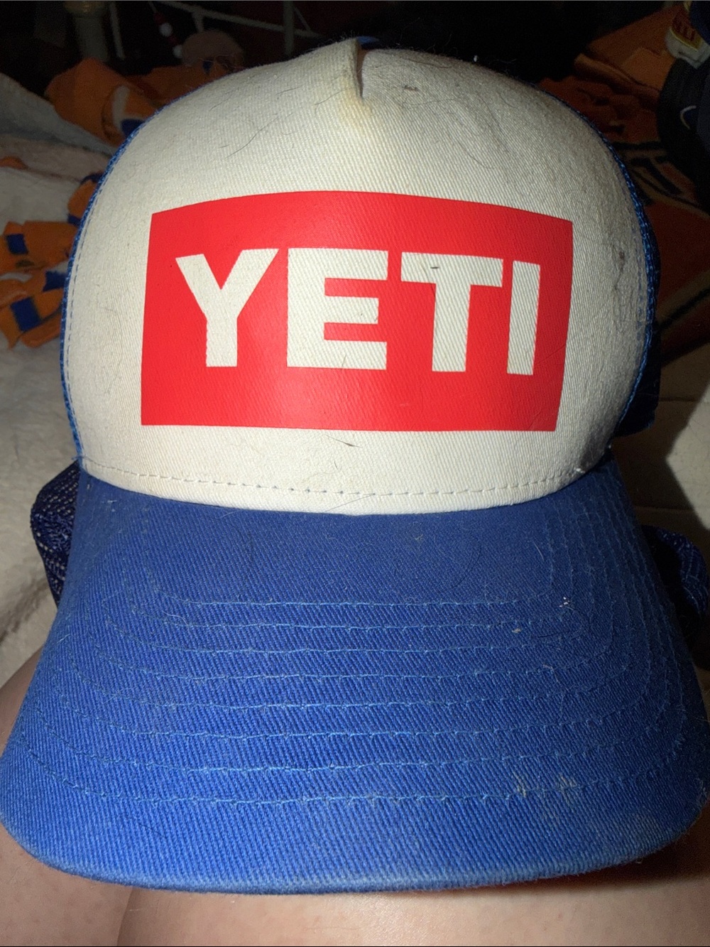 Yeti White Front Trucker Hat with Blue Bill and Red Logo